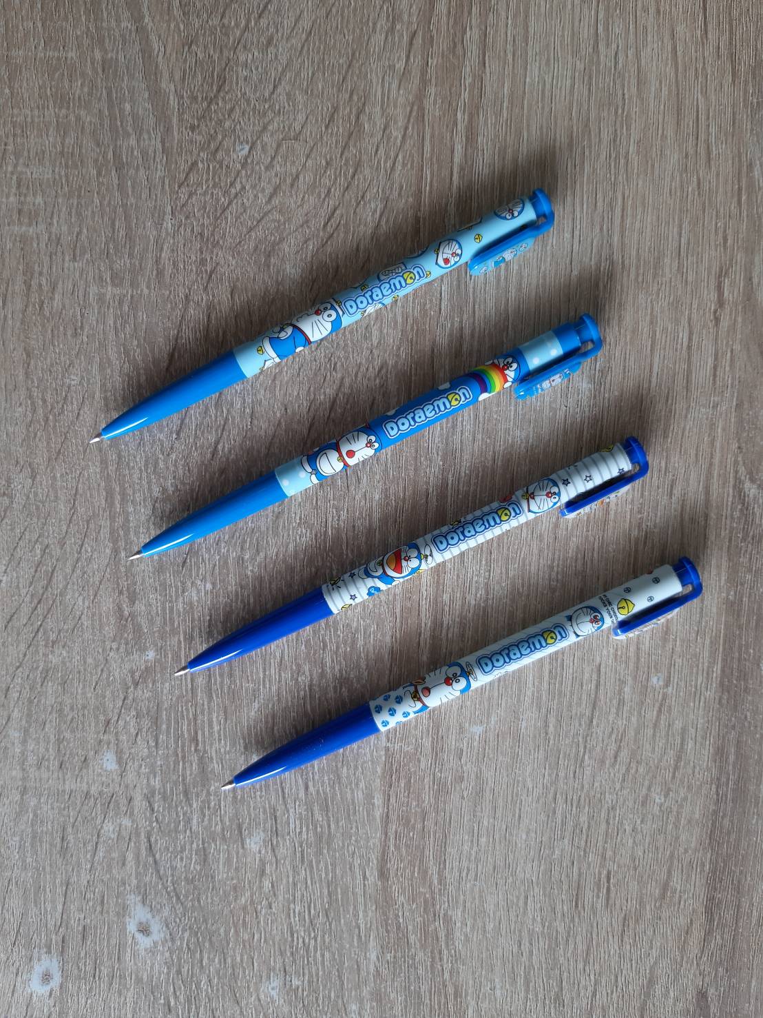 ปากกากดแฟนซี ซีรีส์ โดเรม่อน ไส้สีน้ำเงิน หัวเล็ก0.5 ชิ้นละ 9 บาท สุ่มลาย 📦ยกกล่อง 60แท่ง ✔️พร้อมส่ง เครื่องเขียน